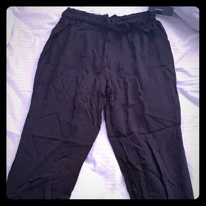 Brand new, never worn black drawstring pants.
